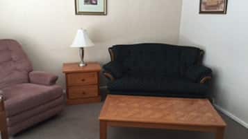 Suite, 1 Bedroom | Living room | Flat-screen TV