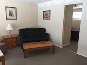 Suite, 1 Bedroom | Living room | Flat-screen TV - Trail Motel & RV Park (Trail)