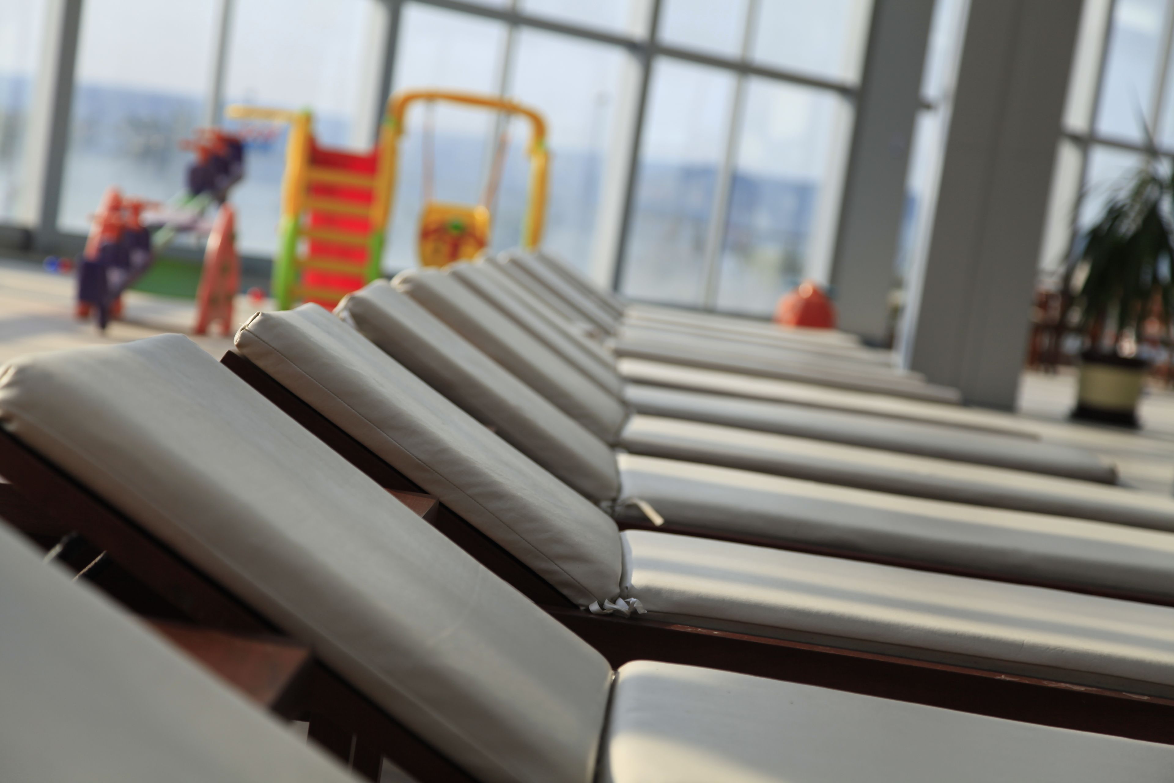 indoor pool, seasonal outdoor pool, pool umbrellas, pool loungers