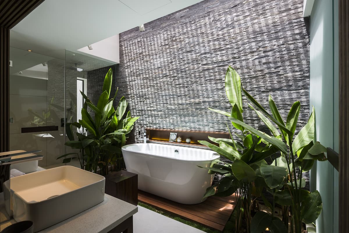 designer toiletries, hair dryer, bathrobes, slippers