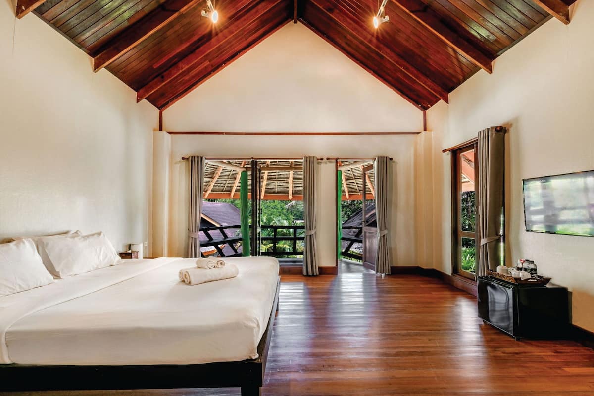 family room with garden view | 1 bedroom, in-room safe, rollaway beds, free wifi