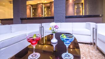 3 bars/lounges, poolside bar, beach bar