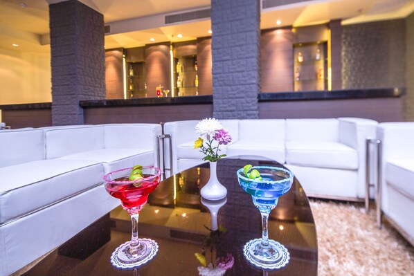 3 bars/lounges, poolside bar, beach bar