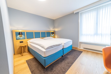 1 habitación, escritorio, wifi gratis y ropa de cama