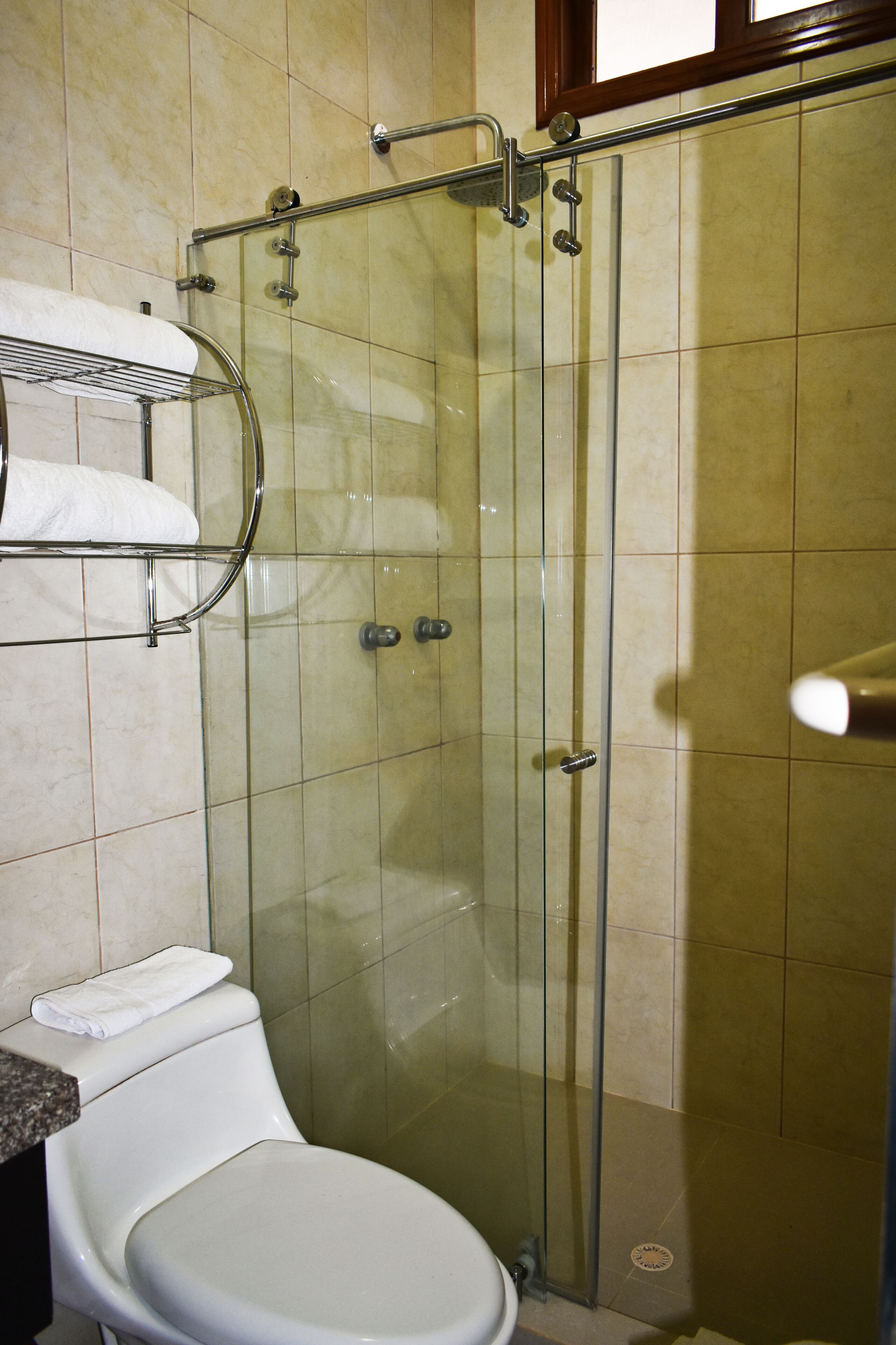 economy twin room | bathroom | shower, free toiletries, hair dryer, towels