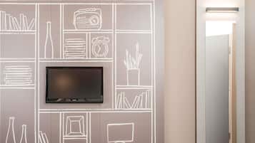 Hypo-allergenic bedding, desk, laptop workspace, blackout drapes