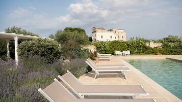 Outdoor pool, open 10:00 AM to 6:30 PM, free cabanas, pool umbrellas