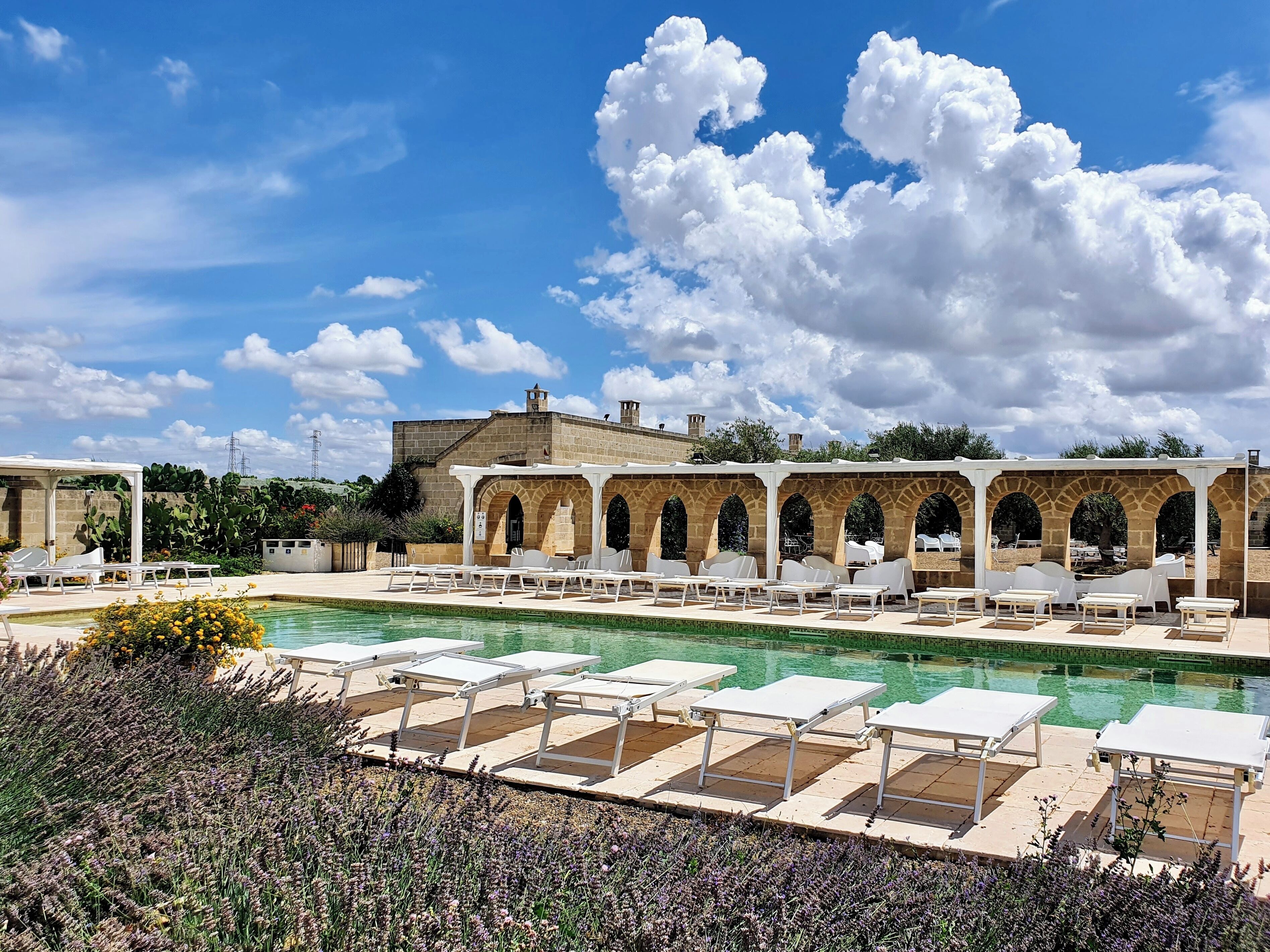 Outdoor pool, open 10:00 AM to 6:30 PM, free pool cabanas
