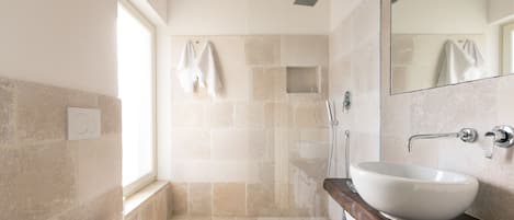 Eco-friendly toiletries, hair dryer, bidet, towels