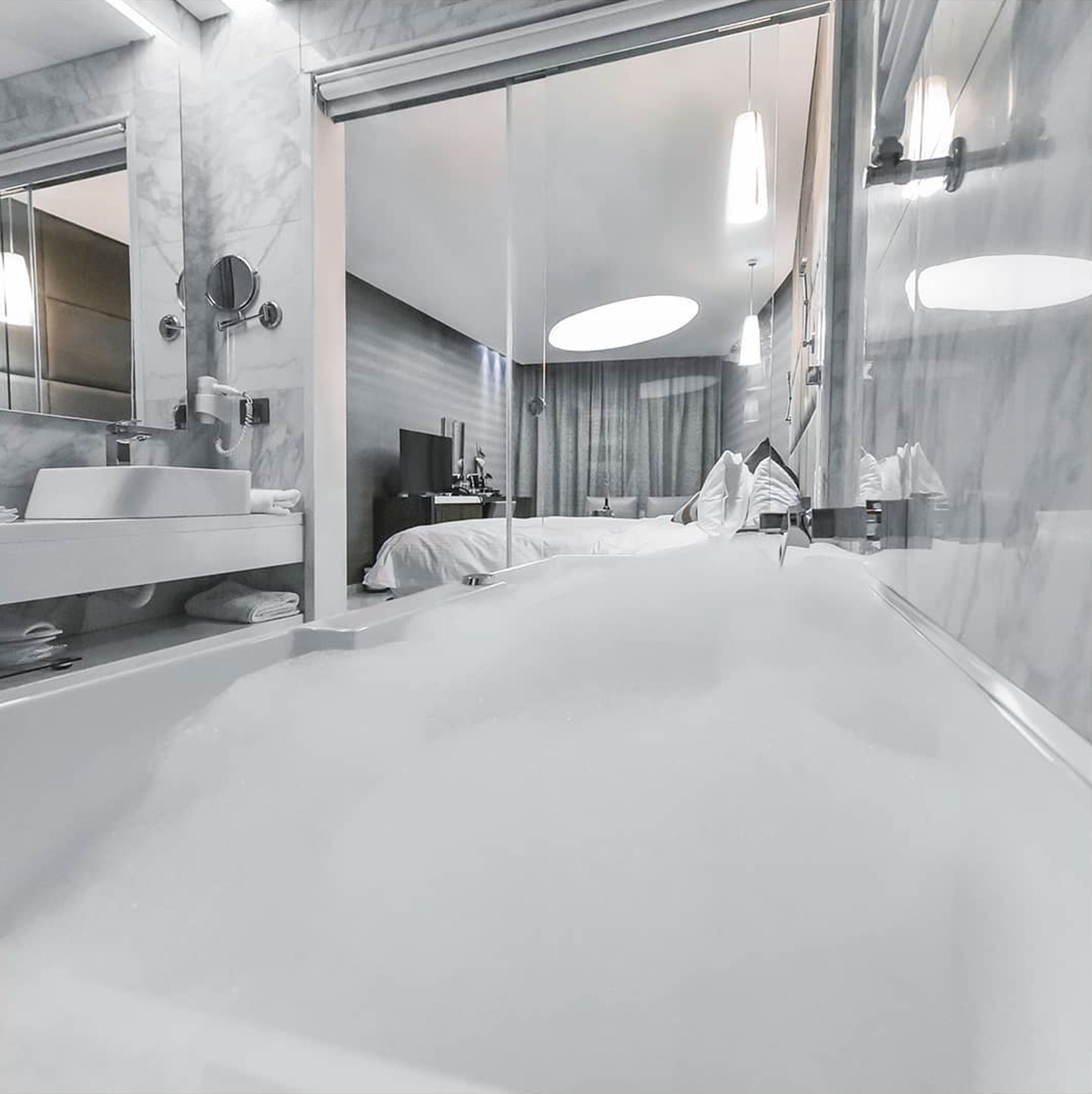 junior suite, 1 king bed, hot tub, sea view | private spa tub