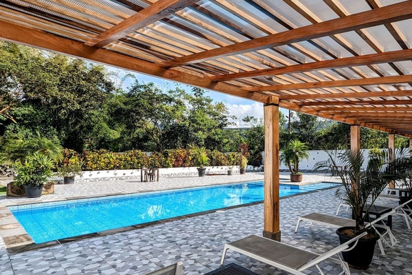 Outdoor pool, pool umbrellas, sun loungers