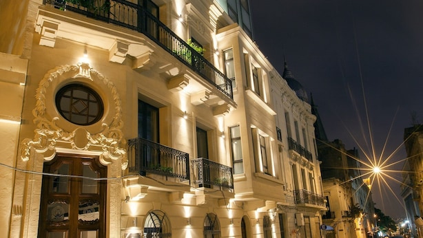 A historic building with ornate architectural details, including a grand entrance and multiple balconies. - Alma Histórica Boutique Hotel (Montevideo)