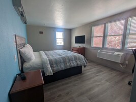 Room, 1 King Bed | Desk, iron/ironing board, free cribs/infant beds, rollaway beds