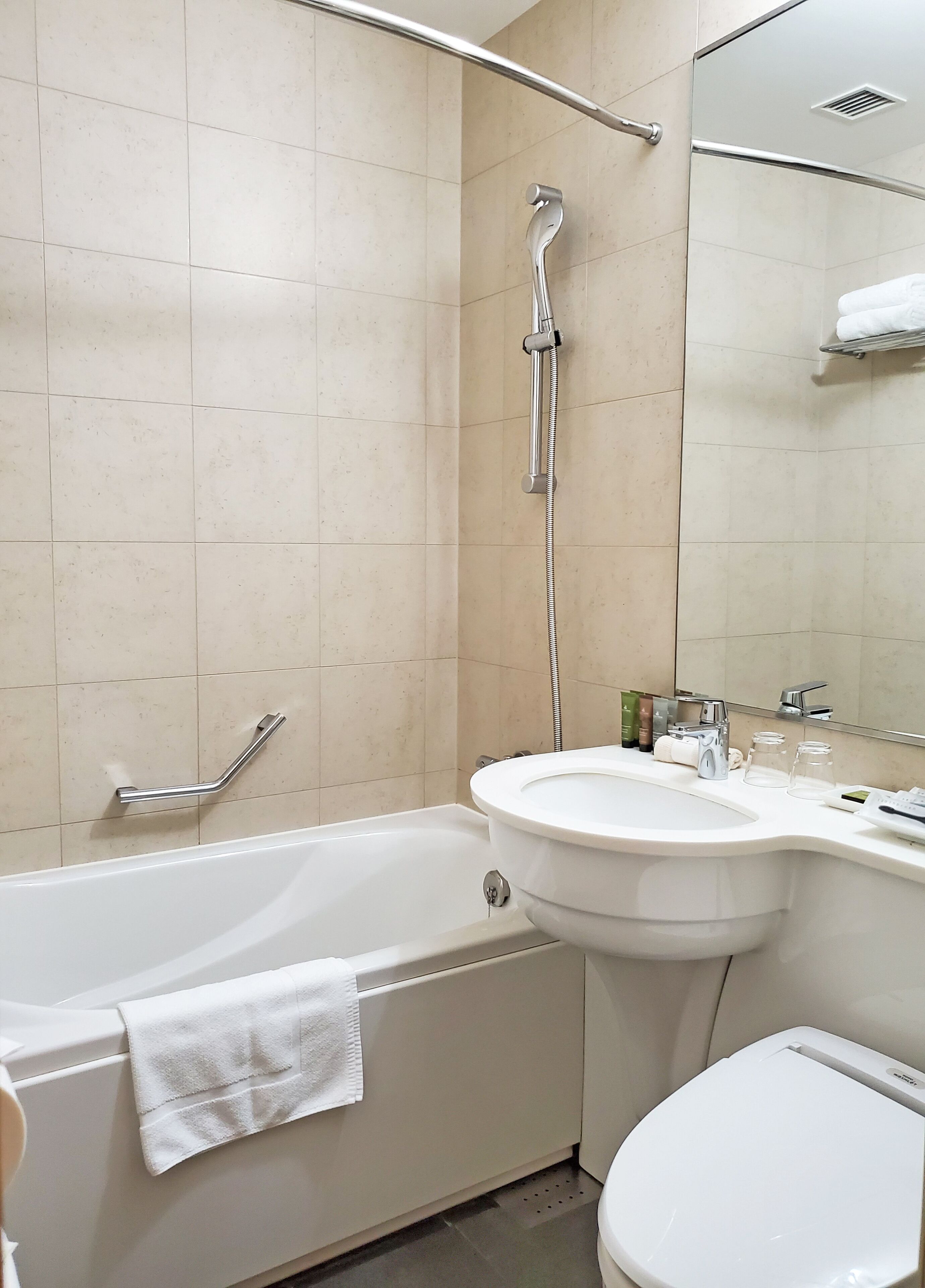 free toiletries, hair dryer, slippers, electronic bidet
