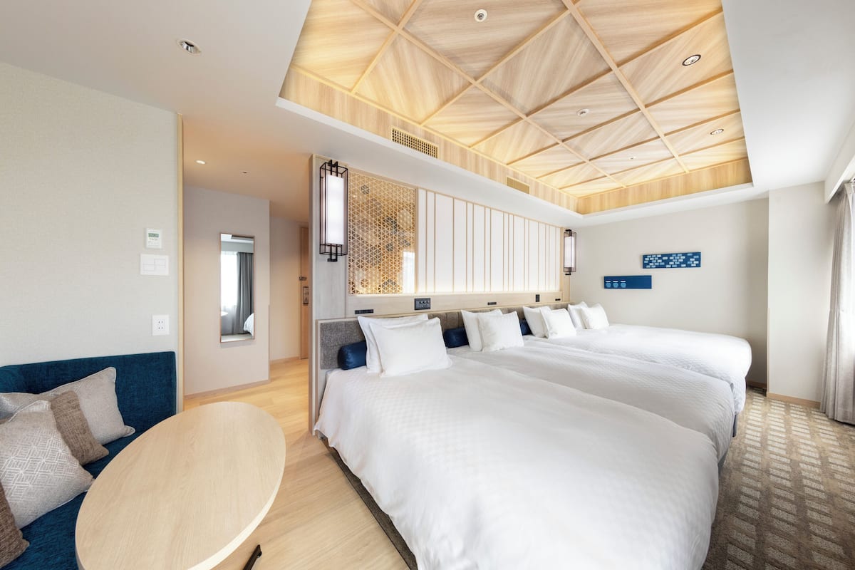 quadruple room | premium bedding, in-room safe, desk, blackout curtains