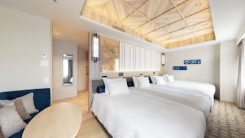 Habitación cuádruple | Ropa de cama de alta calidad y caja de seguridad en la habitación