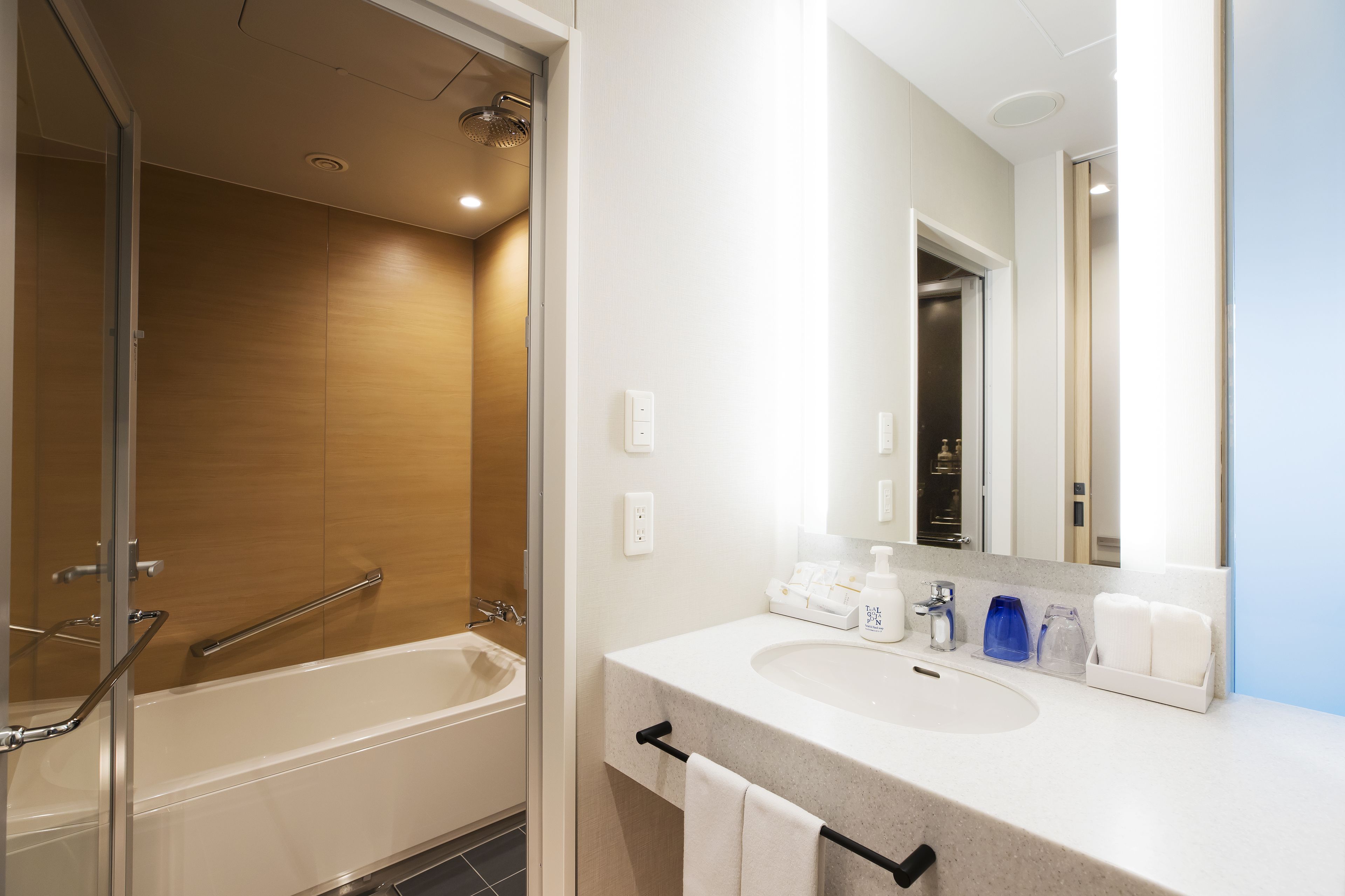 separate bathtub and shower, deep-soaking bathtub, rainfall showerhead