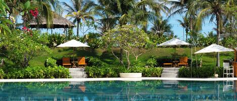 Outdoor pool, open 7:00 AM to 6:00 PM, pool umbrellas, sun loungers