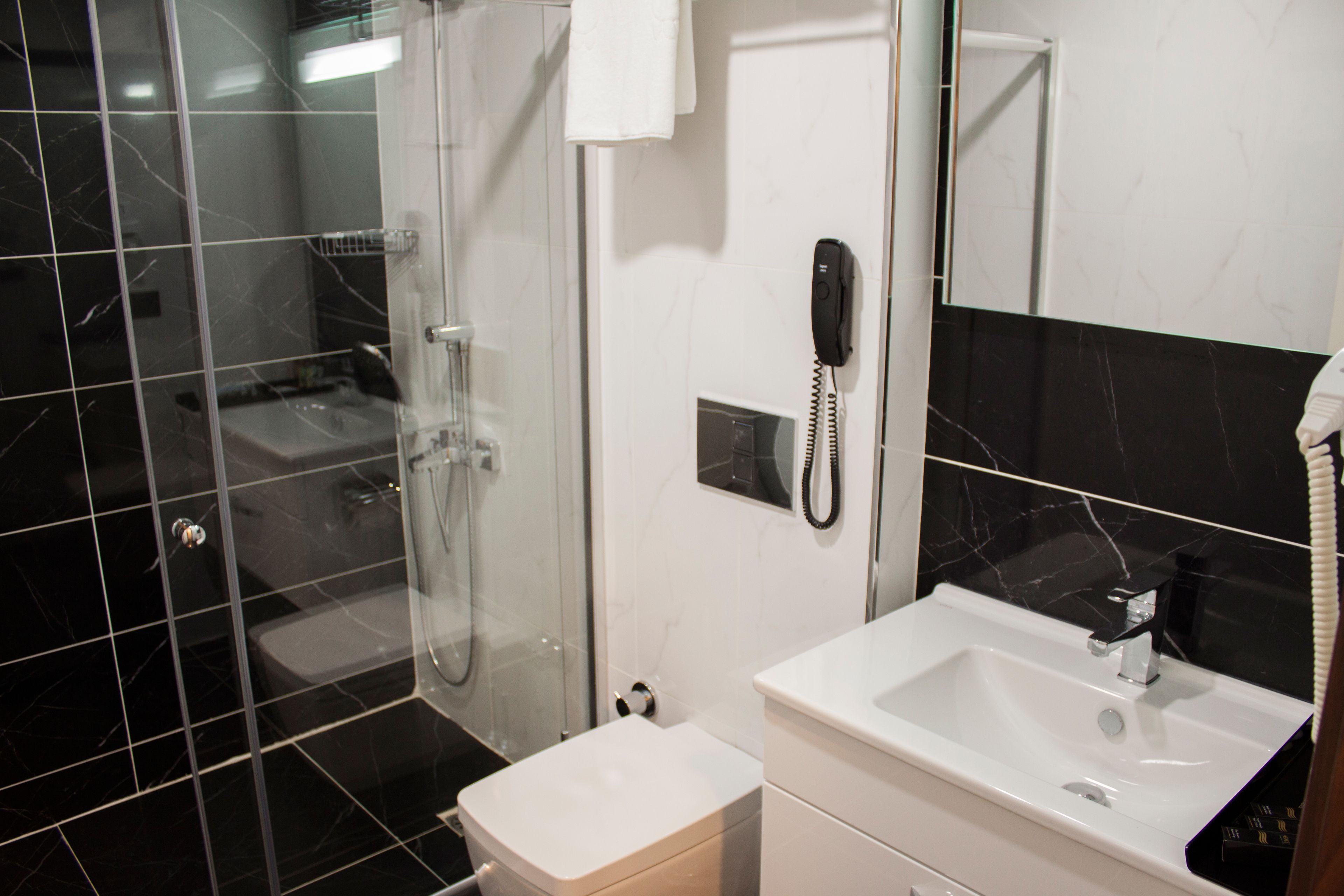 shower, free toiletries, hair dryer, dressing gowns