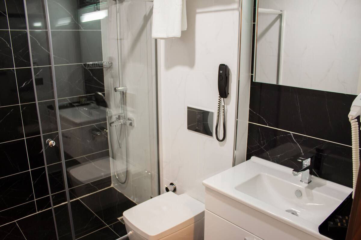 shower, free toiletries, hair dryer, dressing gowns