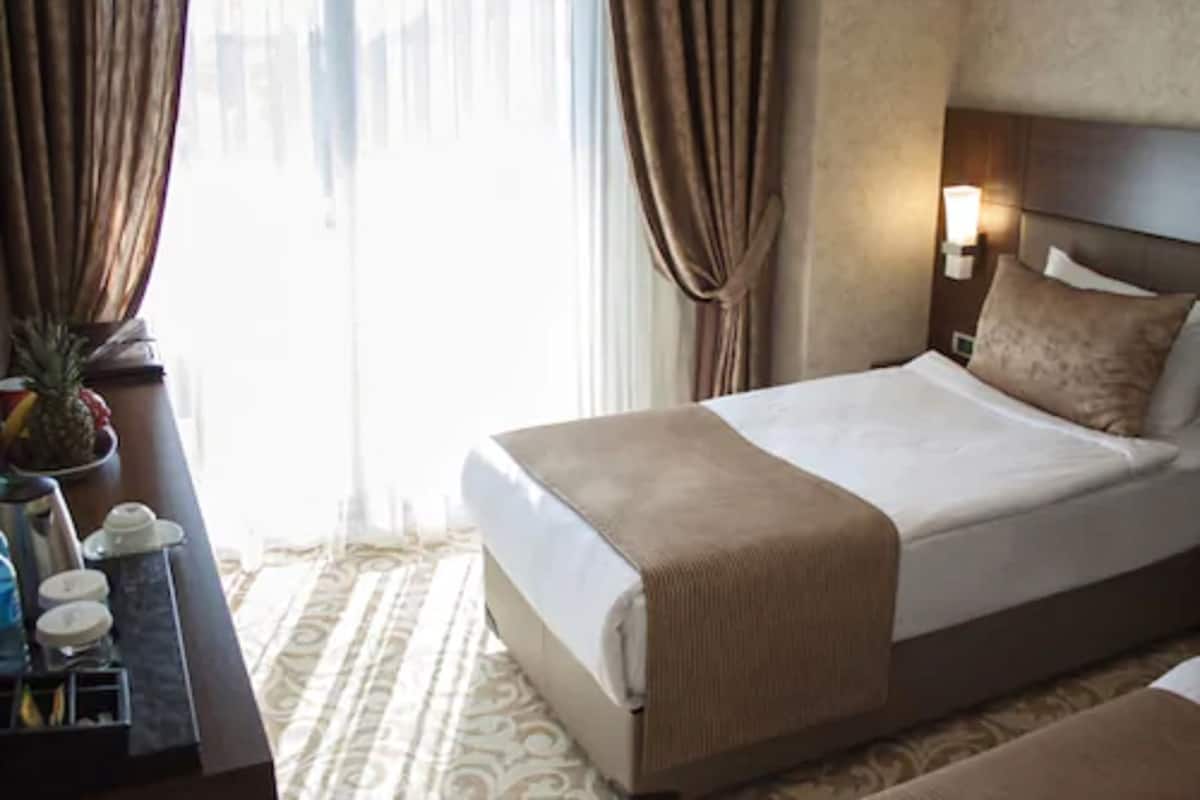 Ropa de cama de alta calidad y minibar 