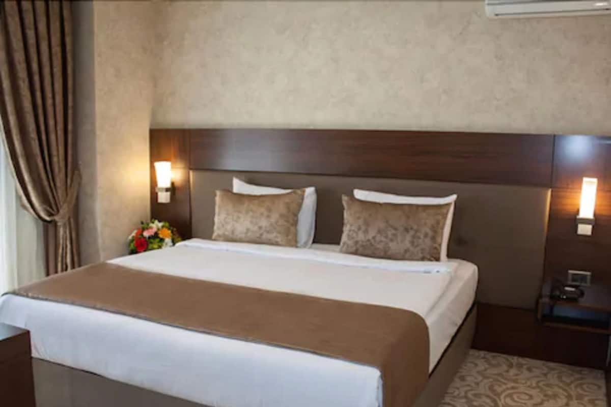 Ropa de cama de alta calidad y minibar 