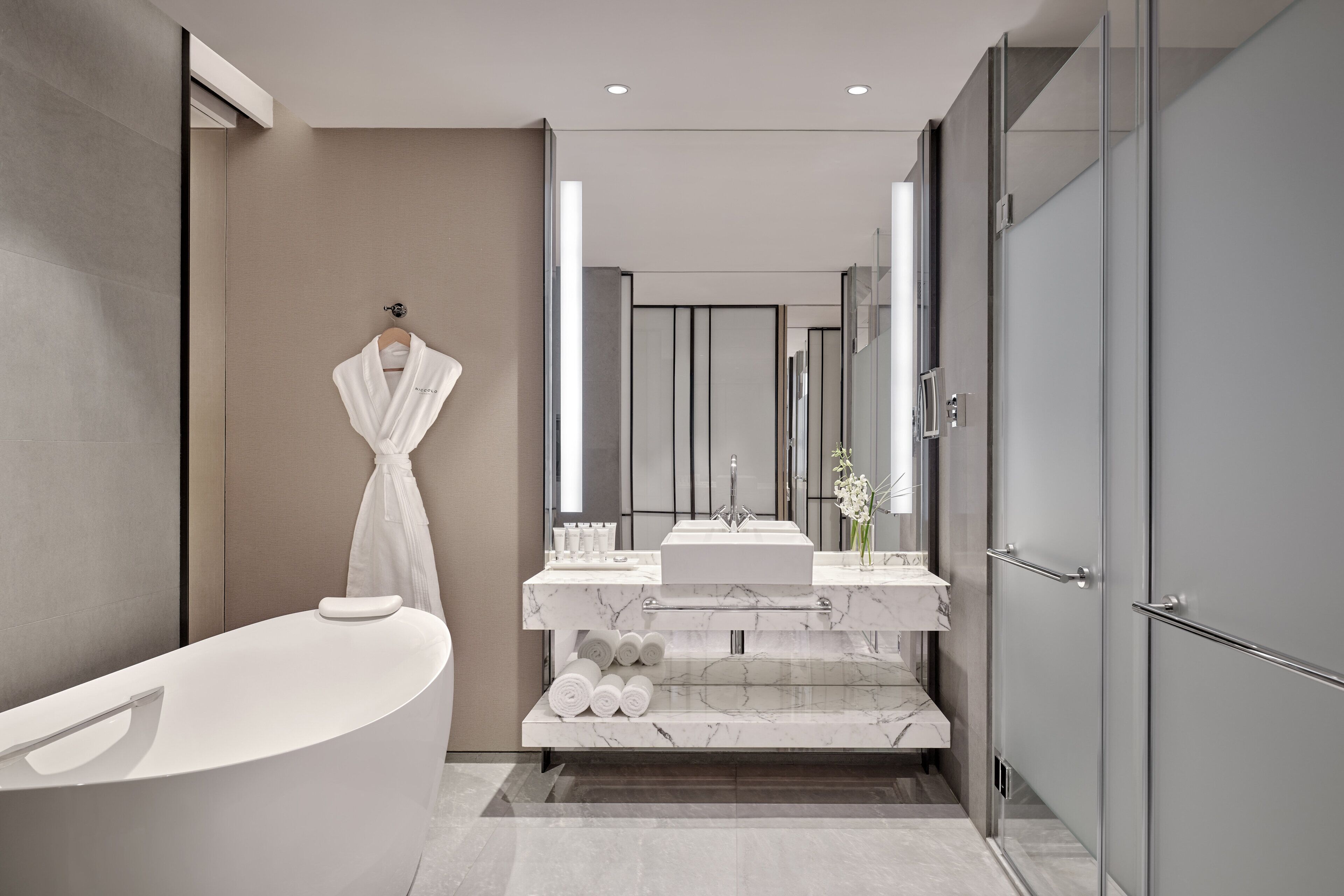 separate bathtub and shower, free toiletries, hair dryer, slippers