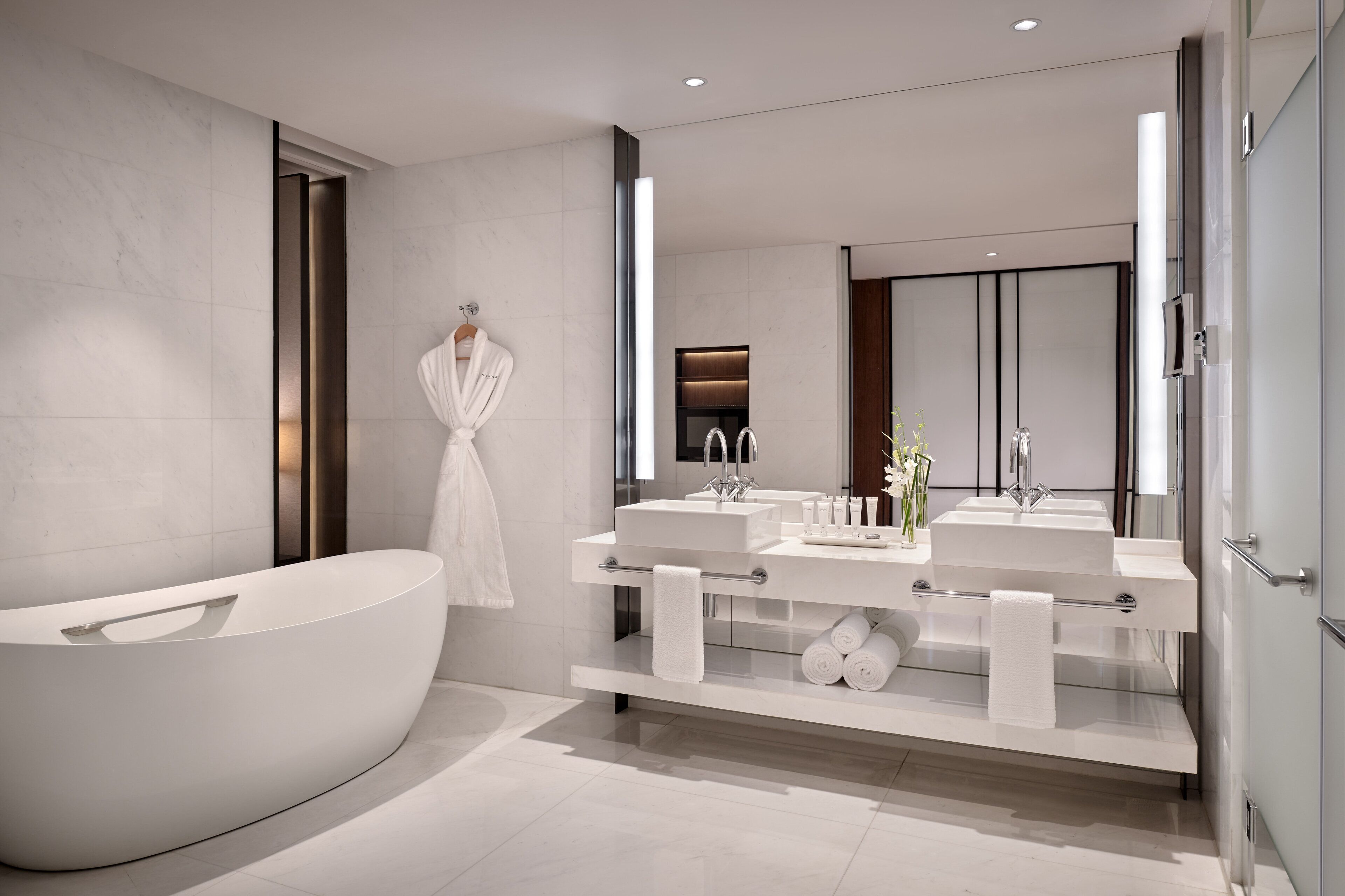 separate bathtub and shower, free toiletries, hair dryer, slippers