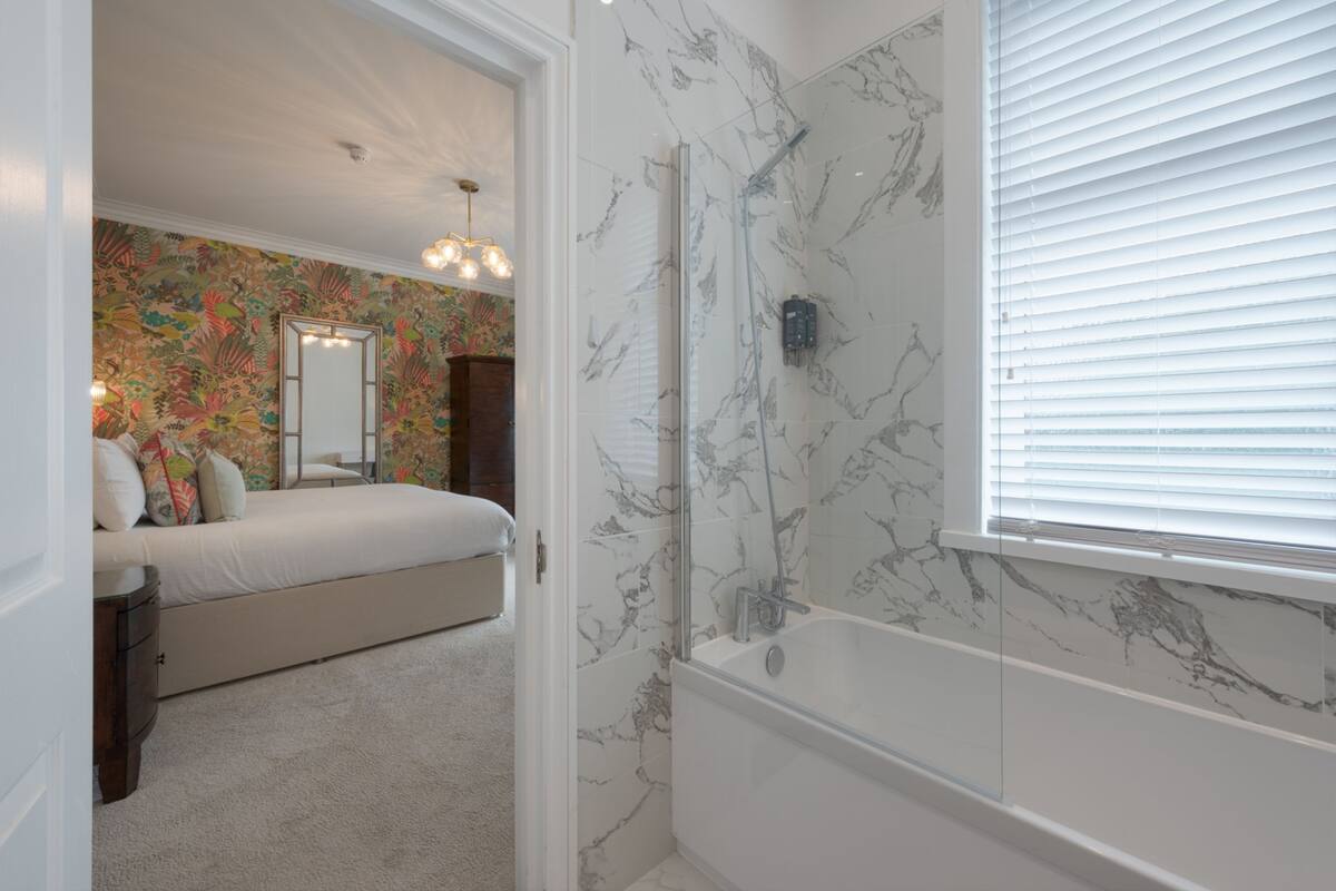 superior superking with bath & shower | bathroom | designer toiletries, hair dryer, towels, soap