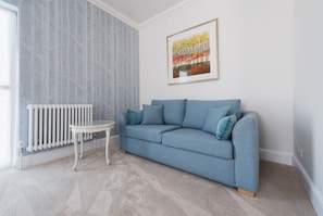 Superior Superking Suite with Bath & Shower | Living area | Flat-screen TV