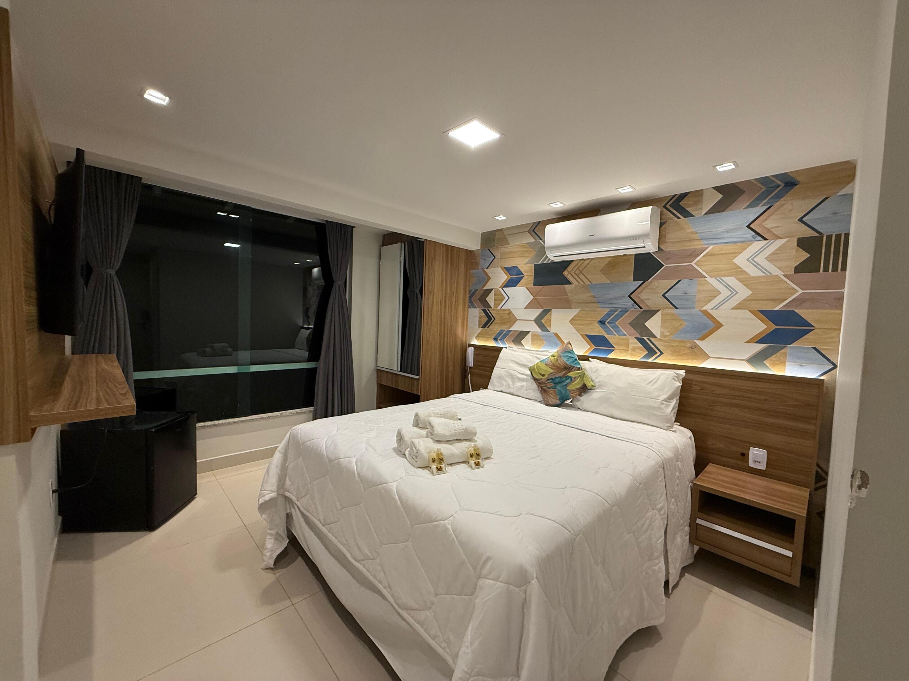 Panorama kamer | Luxe beddengoed, een minibar, een kluis op de kamer