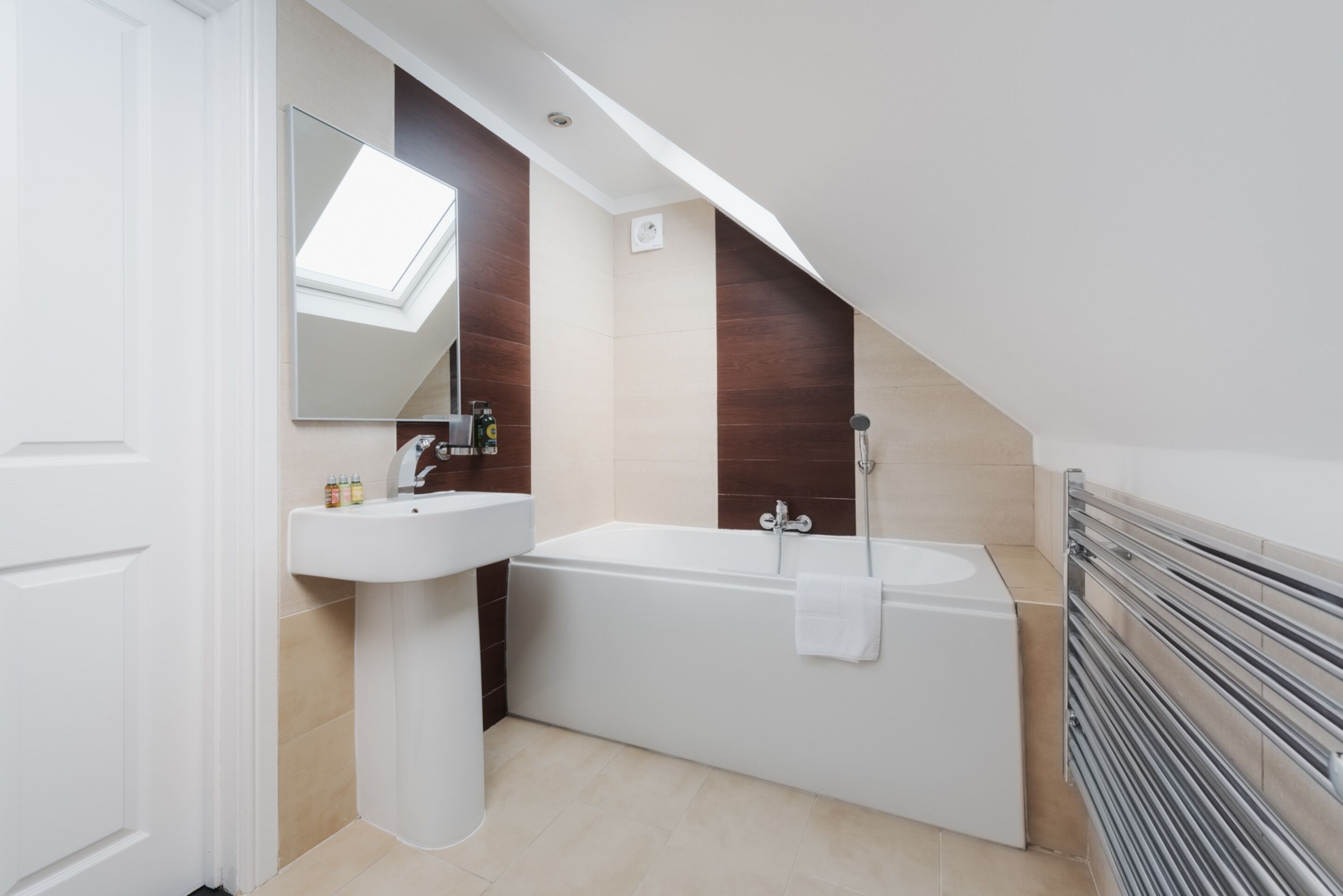 deluxe double with bath | bathroom | designer toiletries, hair dryer, towels