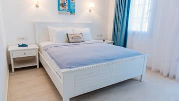 Ropa de cama de alta calidad y minibar