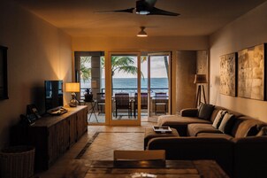 Senior Suite, Ocean View | Living area | TV
