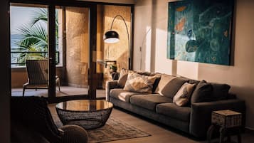 Grand Suite, Ocean View | Living area | TV