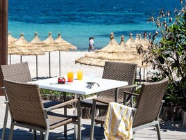 Private beach nearby, white sand, sun loungers, beach umbrellas
