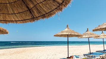 Private beach nearby, white sand, sun loungers, beach umbrellas