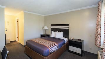 Habitació estàndard, 1 llit de matrimoni | Escriptori, cortines opaques, planxa i posts de planxar i wifi gratuïta