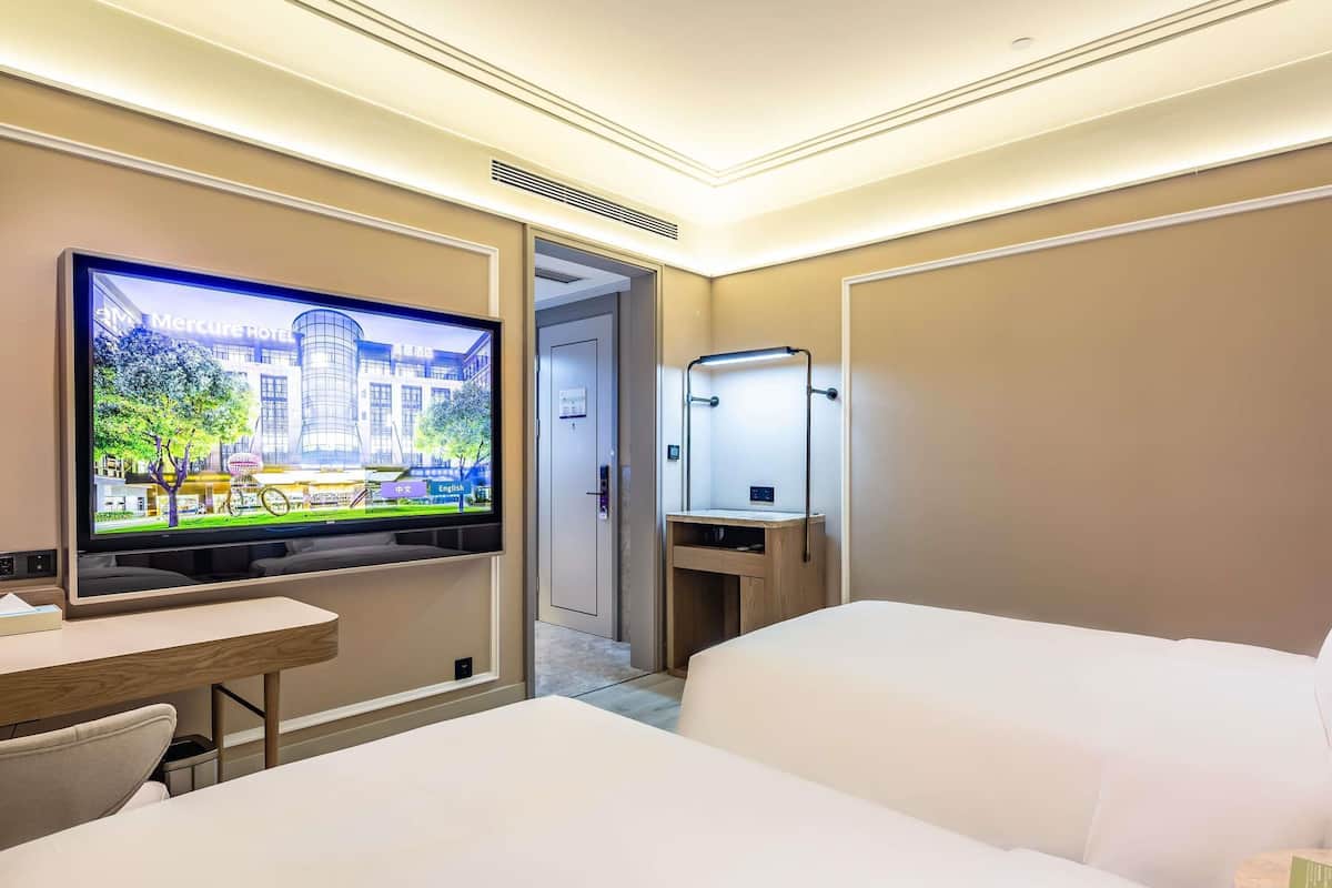 Superior-huone, 2 yhden hengen sänkyä | Untuvapeitot, ilmaiset minibaarituotteet, yksilöllisesti sisustettu