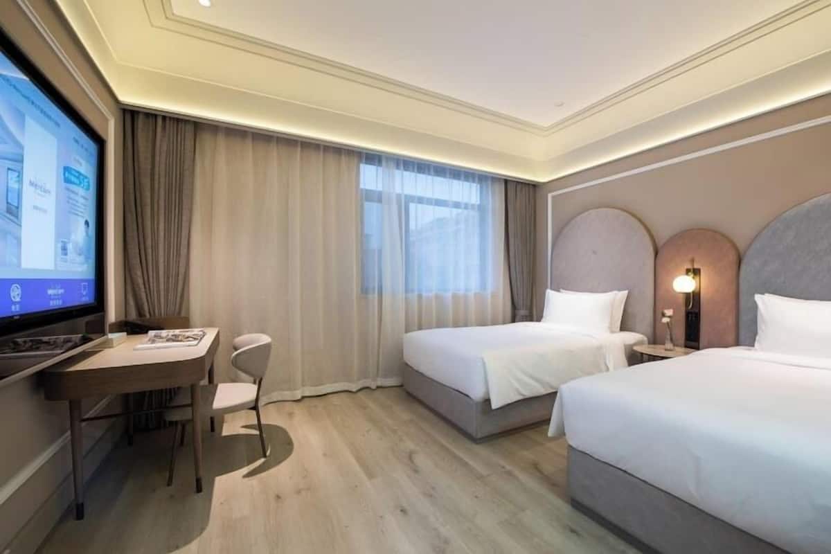 Perhehuone, 2 parisänkyä | Untuvapeitot, ilmaiset minibaarituotteet, yksilöllisesti sisustettu