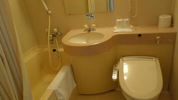 Combined shower/bathtub, free toiletries, hair dryer, bathrobes
