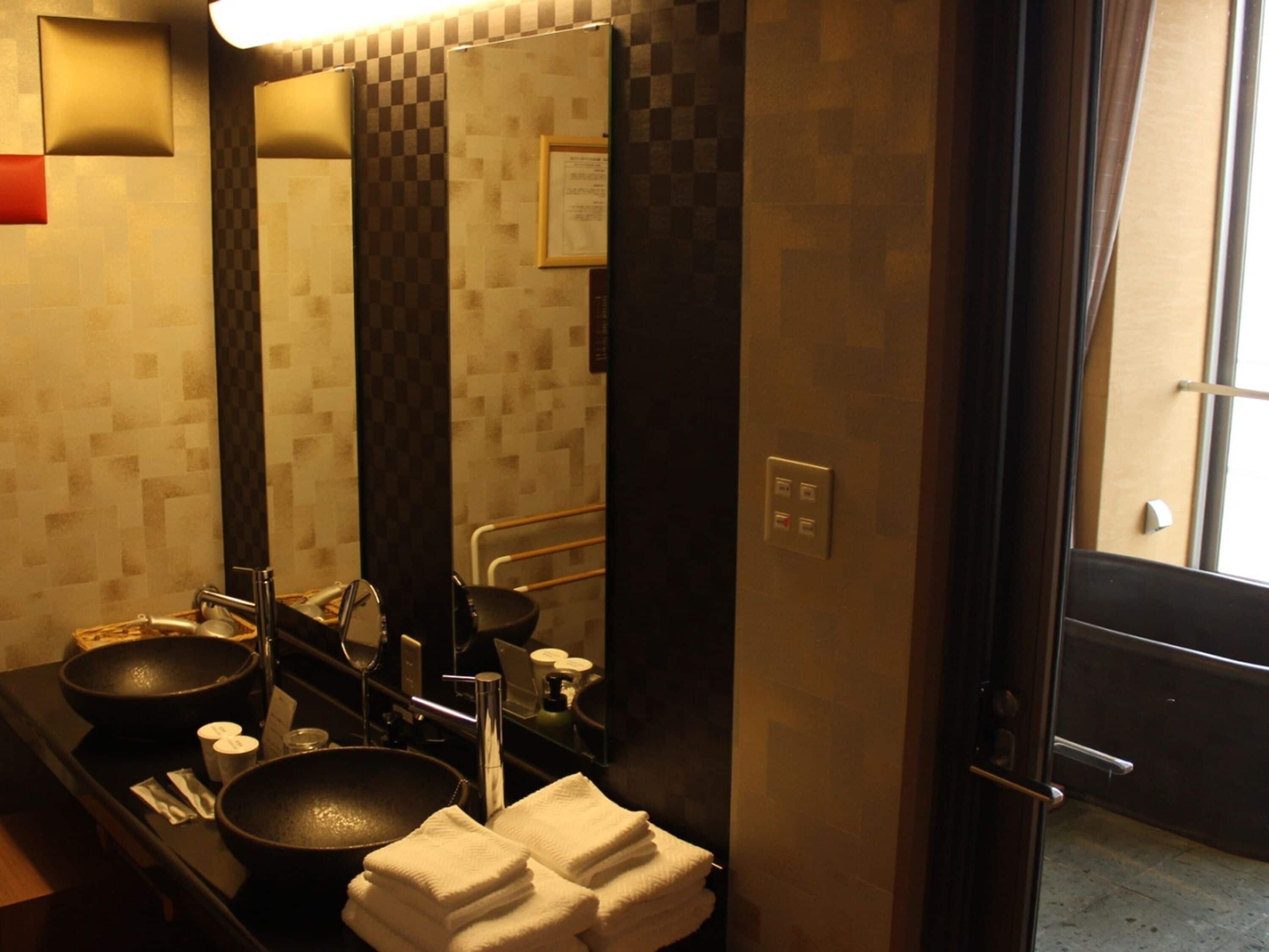 deluxe ocean view & spa with private bath, smoking (50 sqm) | bathroom | separate bathtub and shower, deep-soaking bathtub, free toiletries