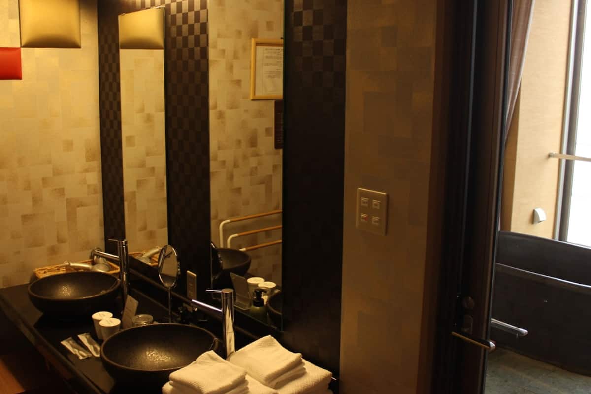 deluxe ocean view & spa with private bath, smoking (50 sqm) | bathroom | separate bathtub and shower, deep-soaking bathtub, free toiletries