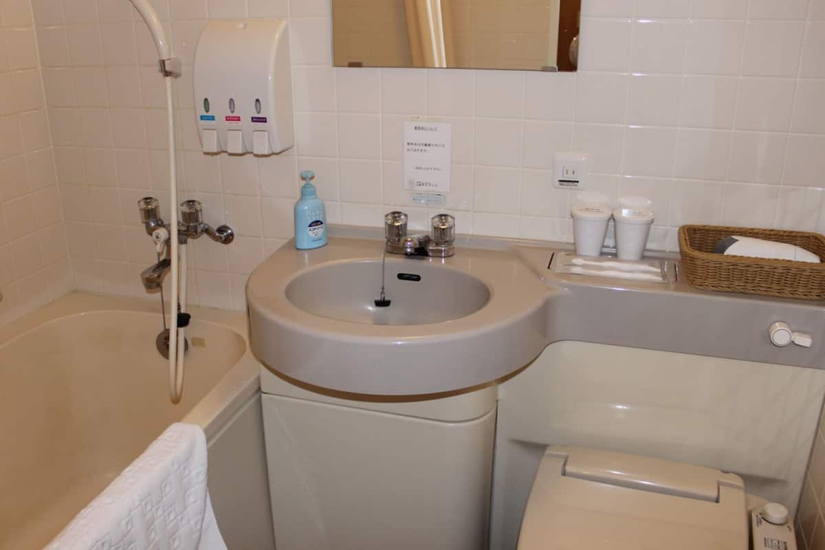 separate bathtub and shower, deep-soaking bathtub, free toiletries