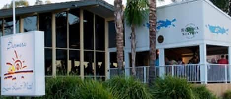 A building with a sign that reads "Bermuda" and a logo for "Bermuda Station."