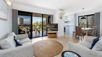 2 Bedroom Ocean View  | Living area | 30-inch TV with cable channels