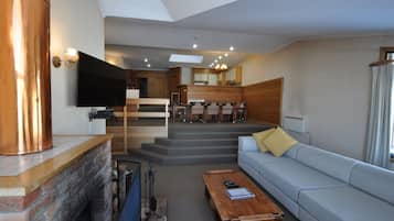 Salzburg 3 Bedroom Apartment (sleeps 8) | Living room | Flat-screen TV, fireplace, DVD player, iPod dock