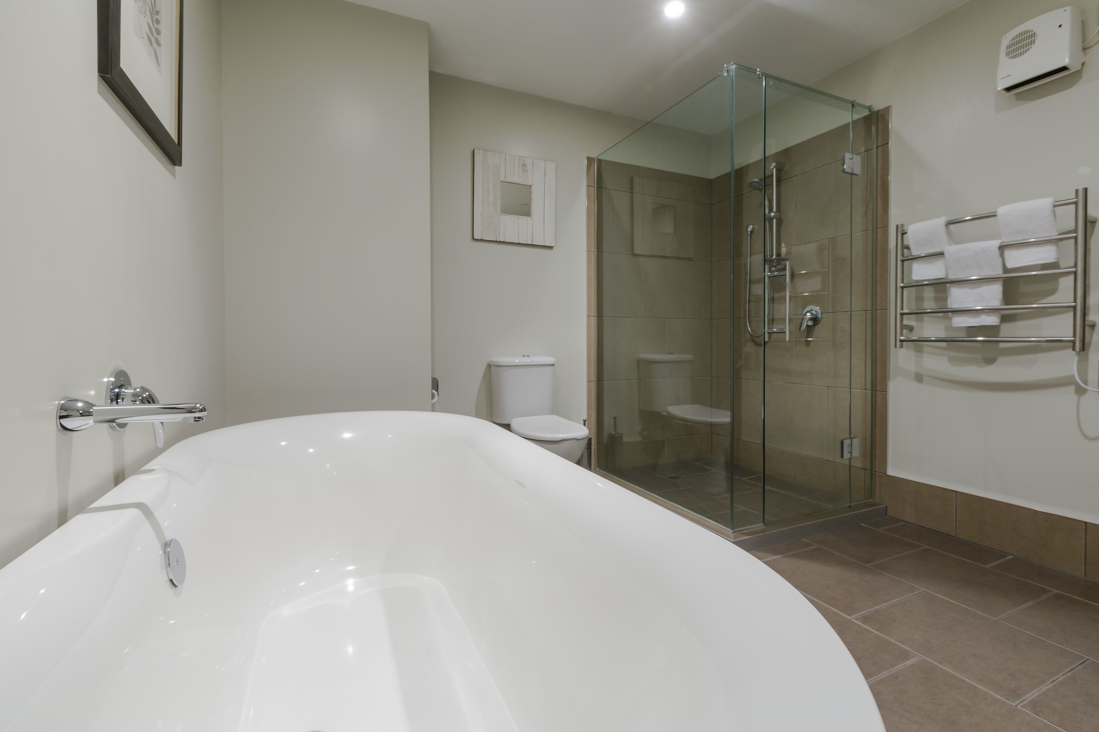 separate bathtub and shower, free toiletries, hair dryer, towels