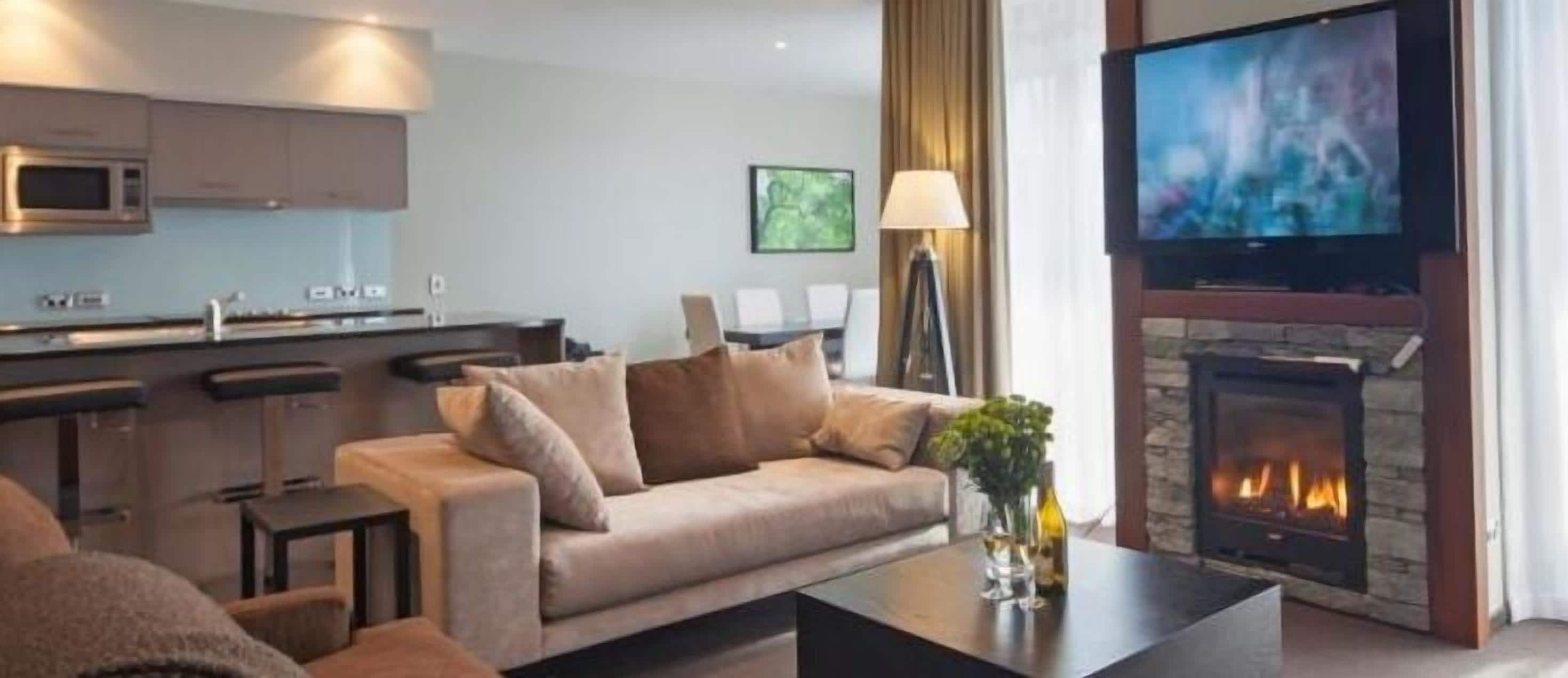 apartment, 3 bedrooms | living area | 55-inch flat-screen tv with cable channels, tv