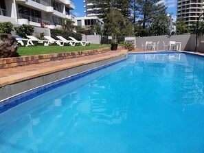 Outdoor pool, open 7:30 AM to 8:30 PM, pool umbrellas, pool loungers